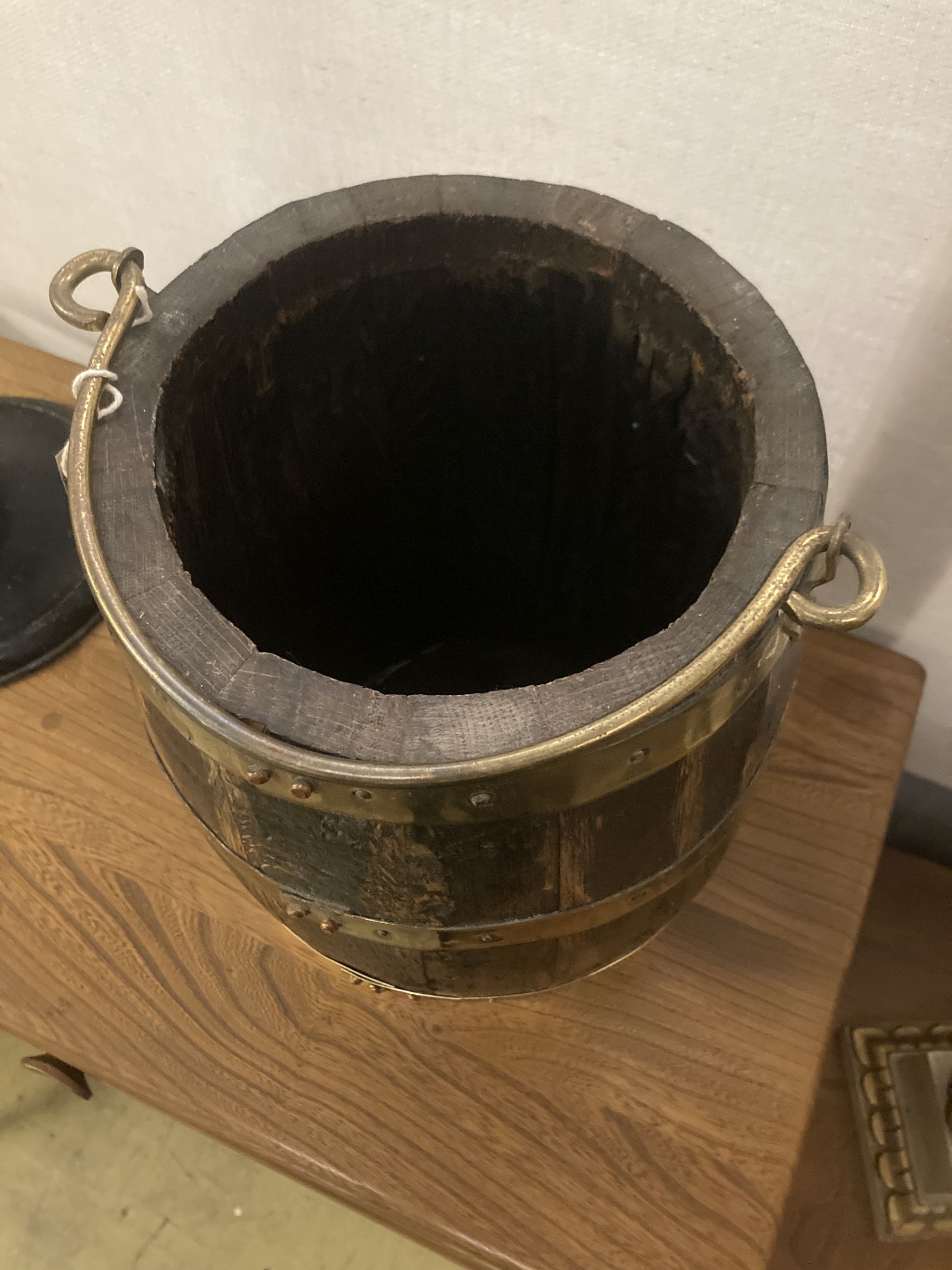 A brass bound staved wood bucket, diameter 26cm height 38cm